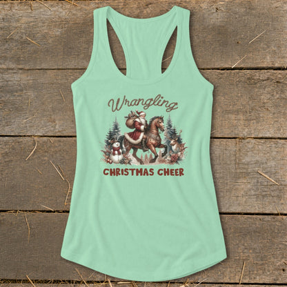 Light green tank top with Santa on horseback and text "Wrangling Christmas Cheer".