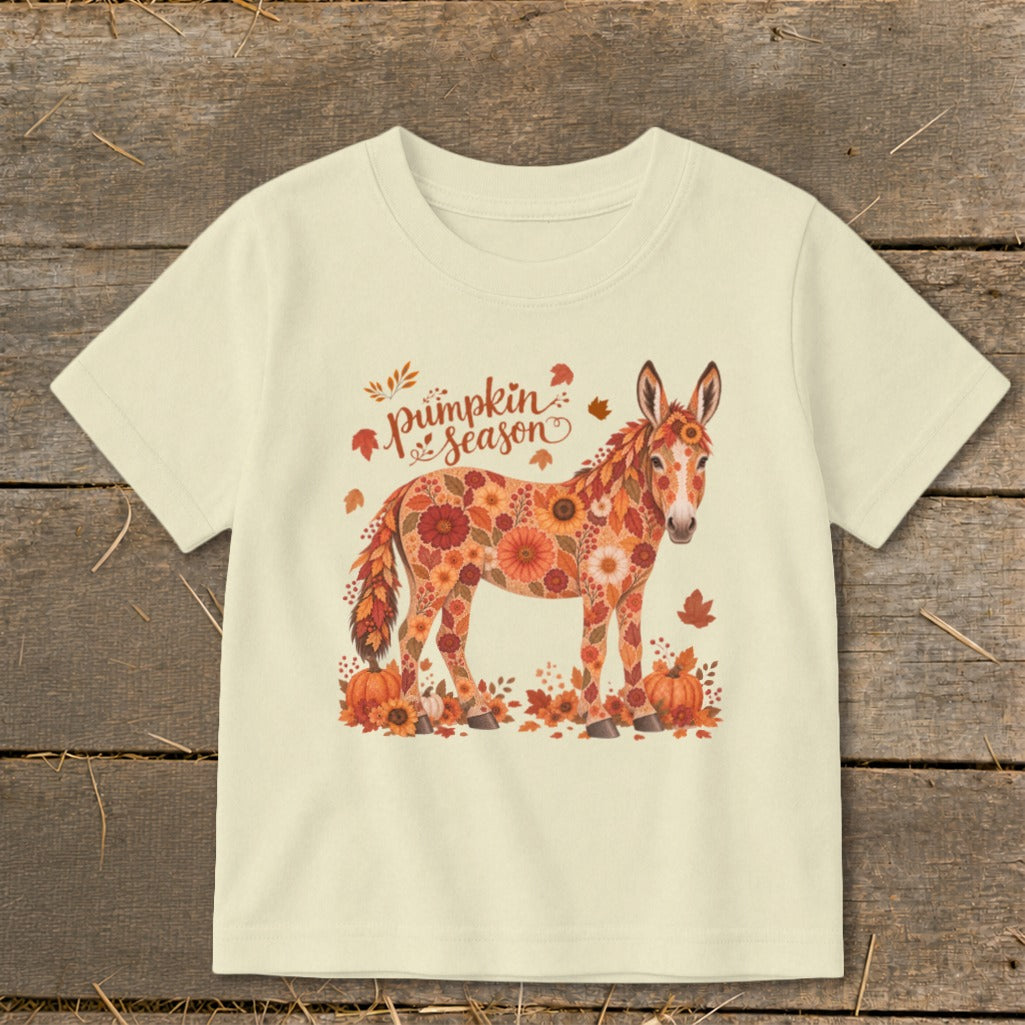 Cream t-shirt with donkey graphic featuring "Pumpkin Season" text.