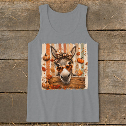 Donkey wearing heart sunglasses and plaid bow, with pumpkins and autumn leaves.