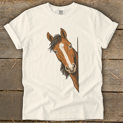Cream t-shirt with a brown horse head peeking from the side.