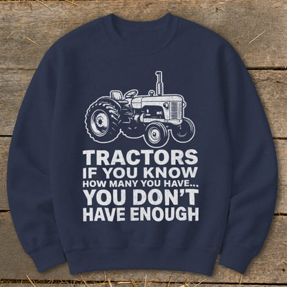 Navy sweatshirt with white tractor graphic and text "Tractors if you know how many you have... you don't have enough".