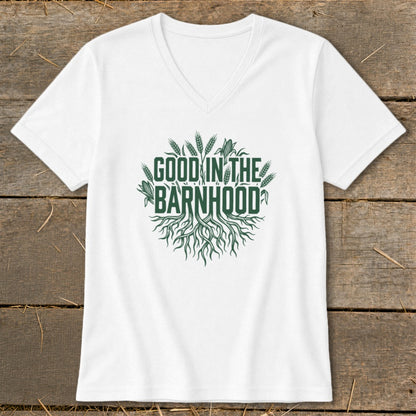 White v-neck t-shirt with green "Good in the Barnhood" text and root design.
