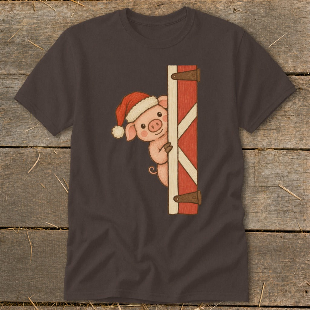Pig in Santa hat peeks from behind a red barn door with white accents.