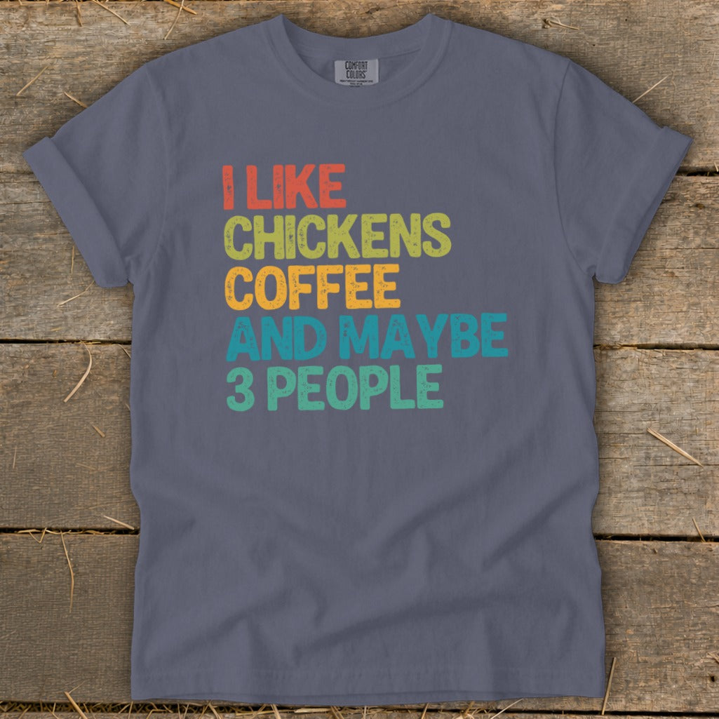Dark grey t-shirt with colorful text: "I LIKE CHICKENS COFFEE AND MAYBE 3 PEOPLE"