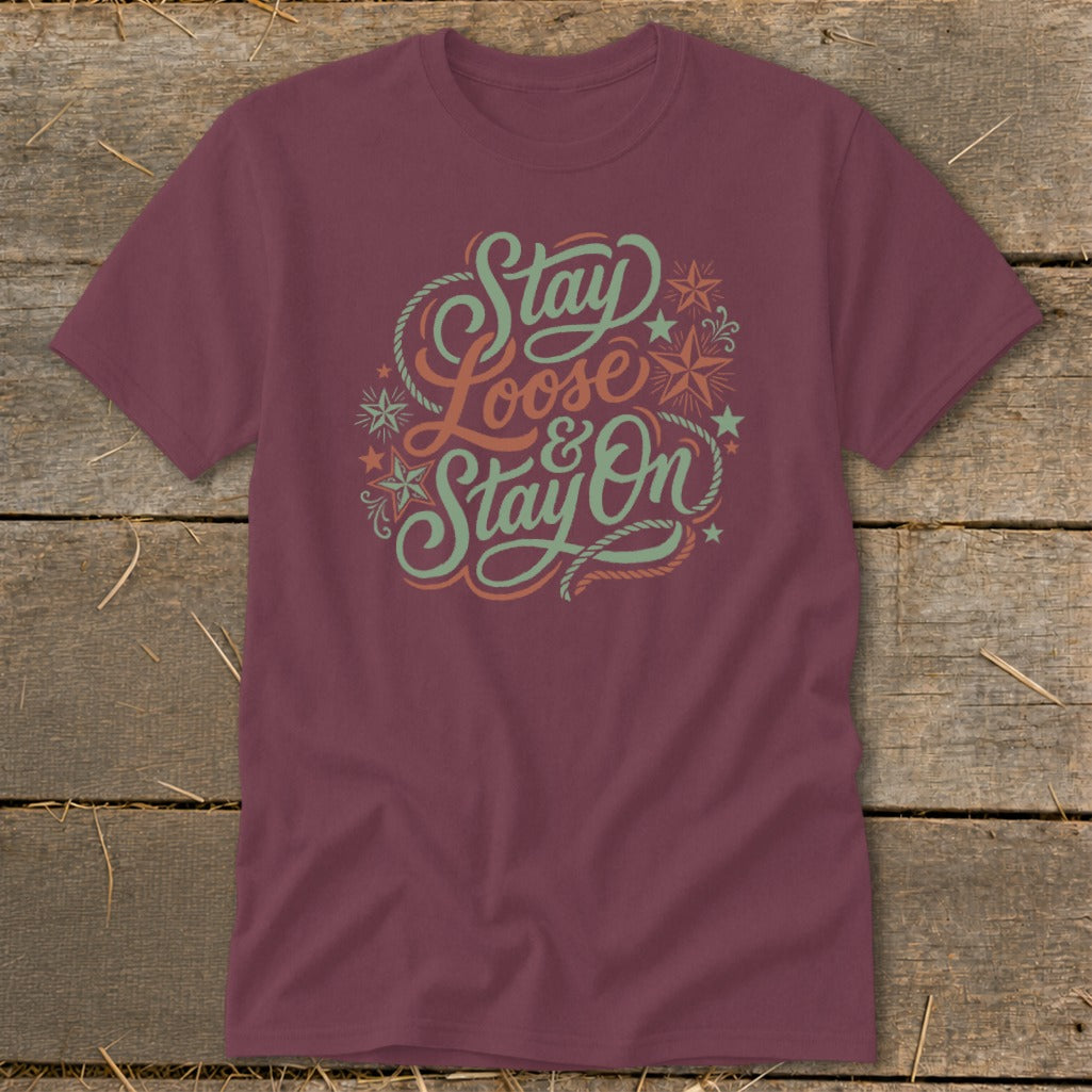 Maroon t-shirt with "Stay Loose & Stay On" in stylized lettering and decorative elements.