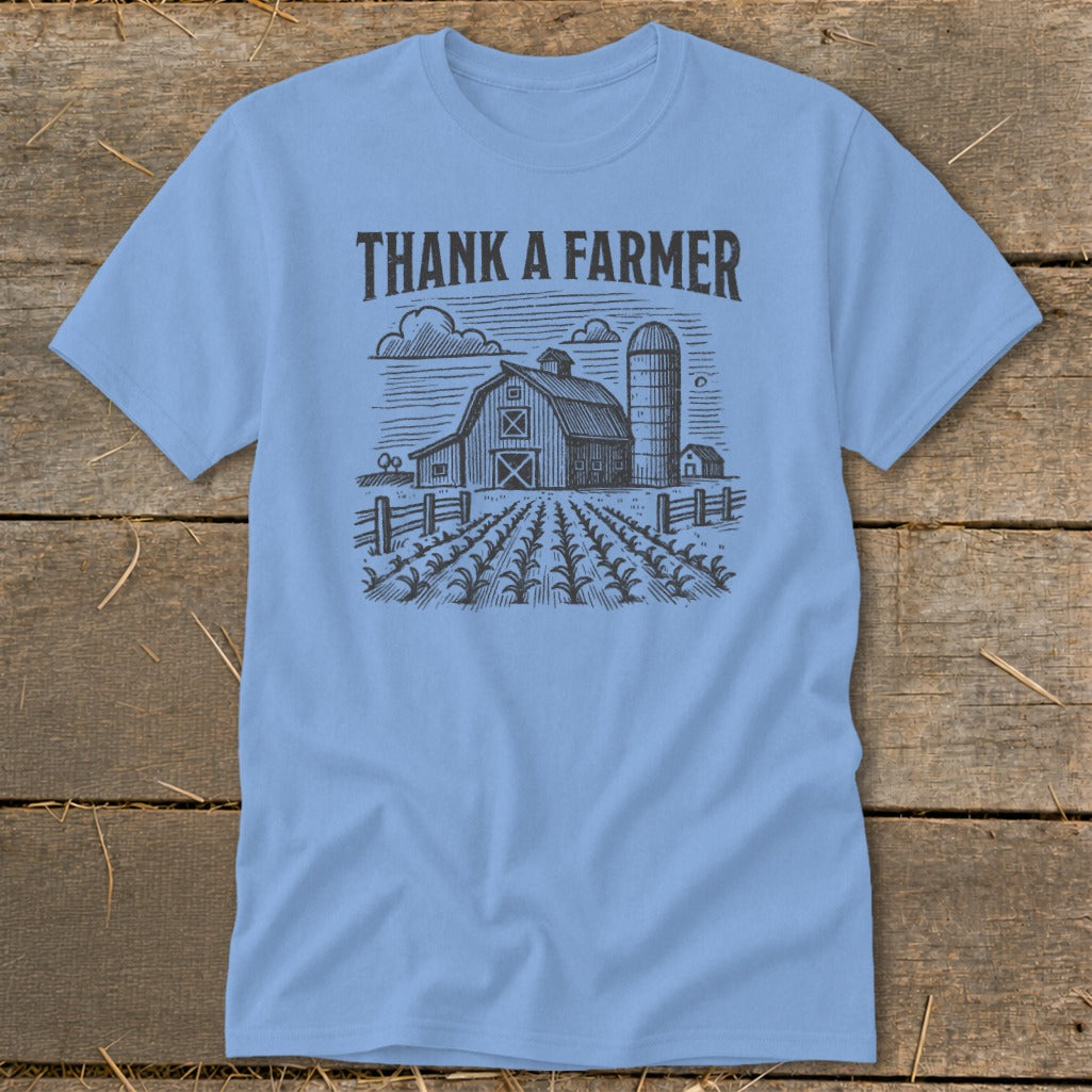Light blue t-shirt with "THANK A FARMER" text and a farm scene graphic.