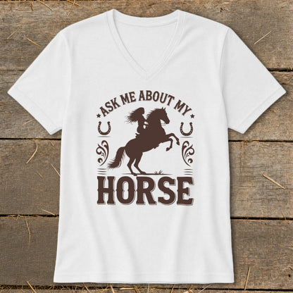 White v-neck t-shirt with brown graphic "Ask me about my horse" and rider silhouette.