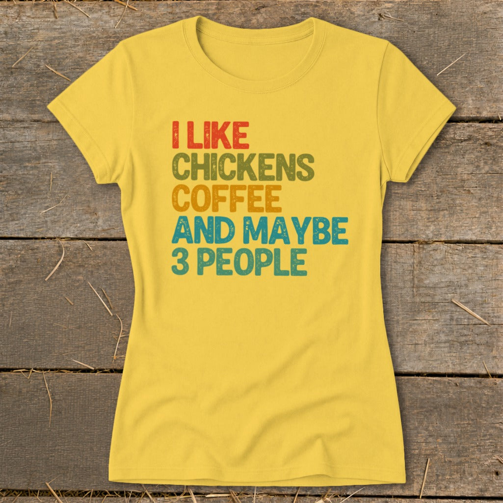 Yellow t-shirt with text "I like chickens coffee and maybe 3 people".
