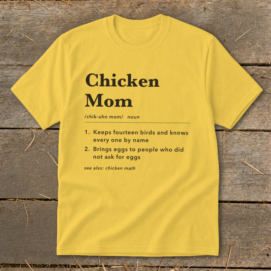 Yellow t-shirt with "Chicken Mom" definition including keeping birds and bringing eggs.