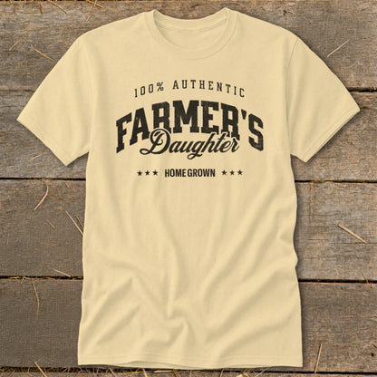 Cream t-shirt with "100% AUTHENTIC FARMER'S Daughter HOME GROWN" text.