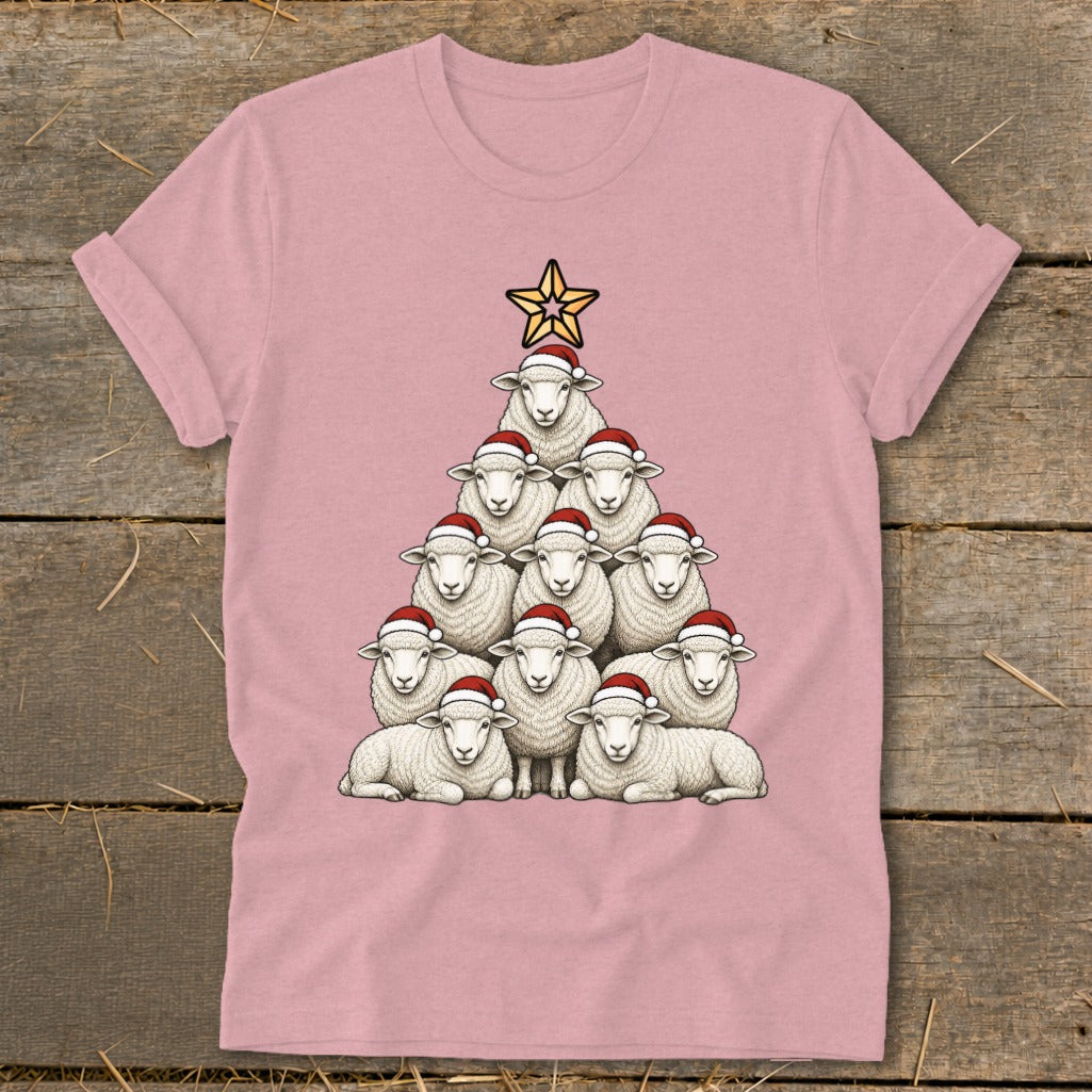 Pink t-shirt with a Christmas tree made of sheep wearing Santa hats and a star.