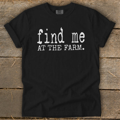 Black t-shirt with white text "find me AT THE FARM."