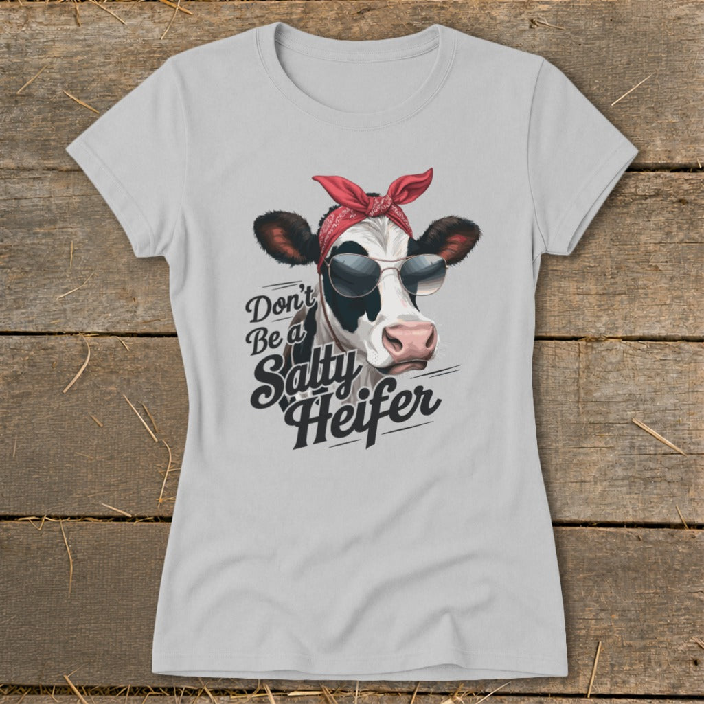 Light grey t-shirt with a cow wearing sunglasses and a bandana, text reads "Don't Be a Salty Heifer".
