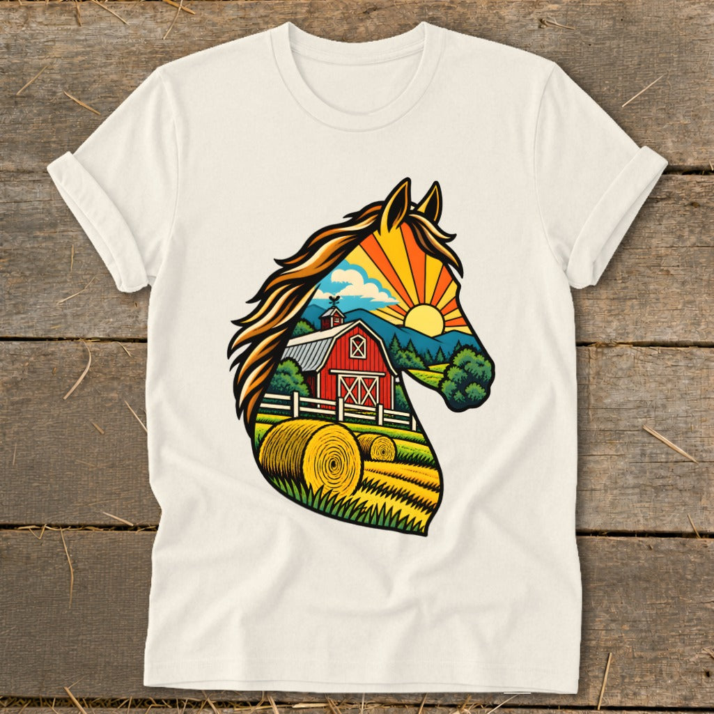 Cream-colored t-shirt with a graphic of a horse head silhouette containing a vibrant farm landscape with a red barn.
