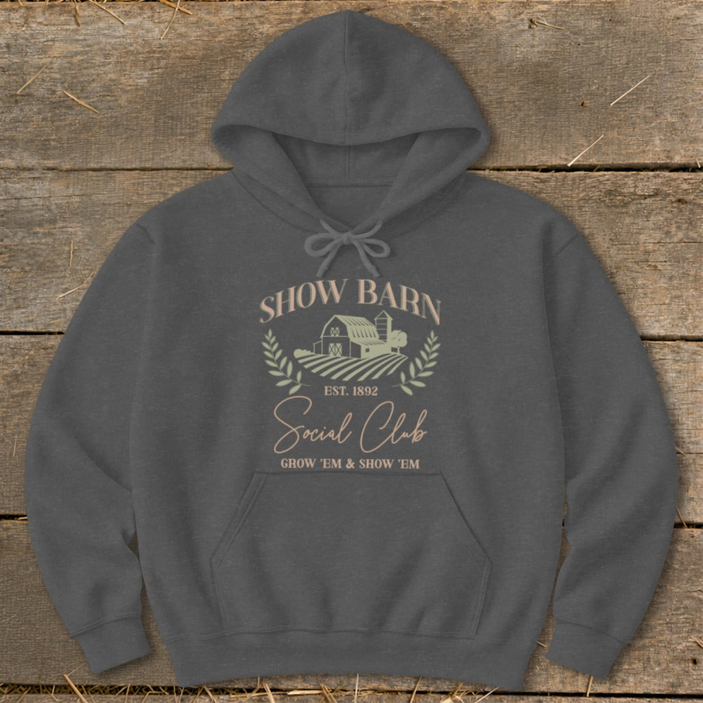 Dark grey hoodie with "Show Barn Social Club" text and farm graphic.
