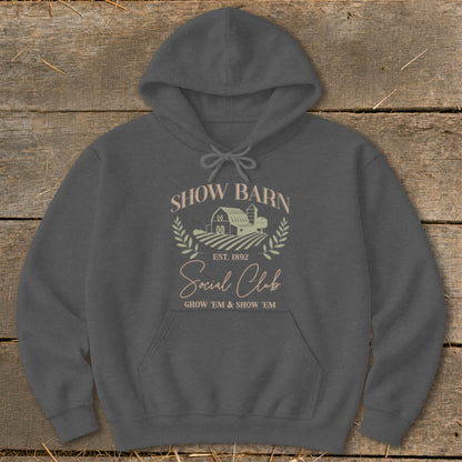 Dark grey hoodie with "Show Barn Social Club" text and farm graphic.