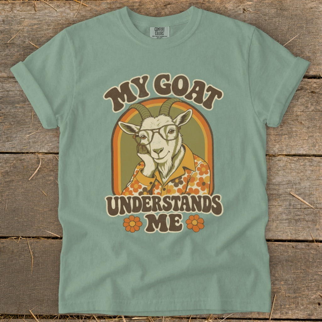 Goat wearing glasses and a floral shirt with text "My goat understands me".