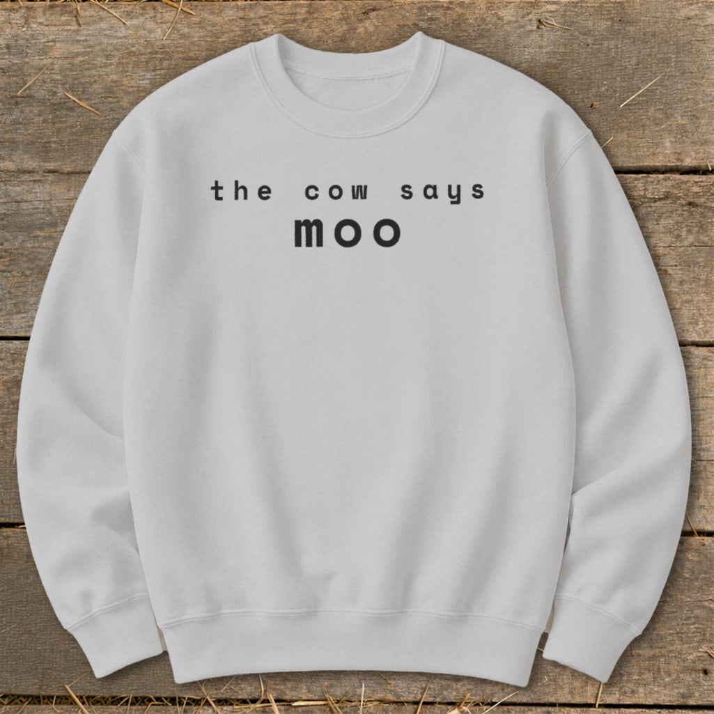 Light grey sweatshirt with "the cow says moo" printed in black text.