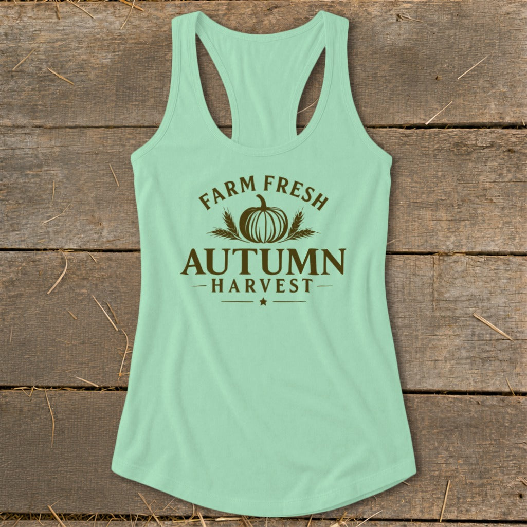 Mint green tank top with "Farm Fresh Autumn Harvest" text and pumpkin graphic.