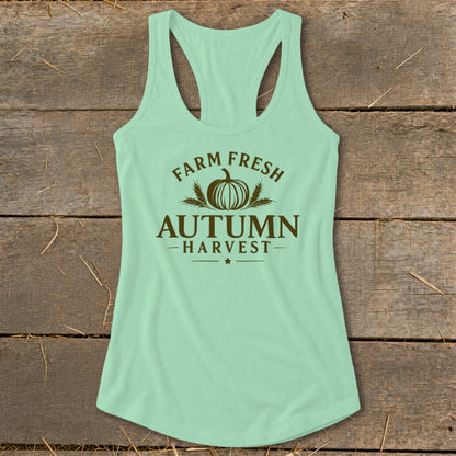 Mint green tank top with "Farm Fresh Autumn Harvest" text and pumpkin graphic.