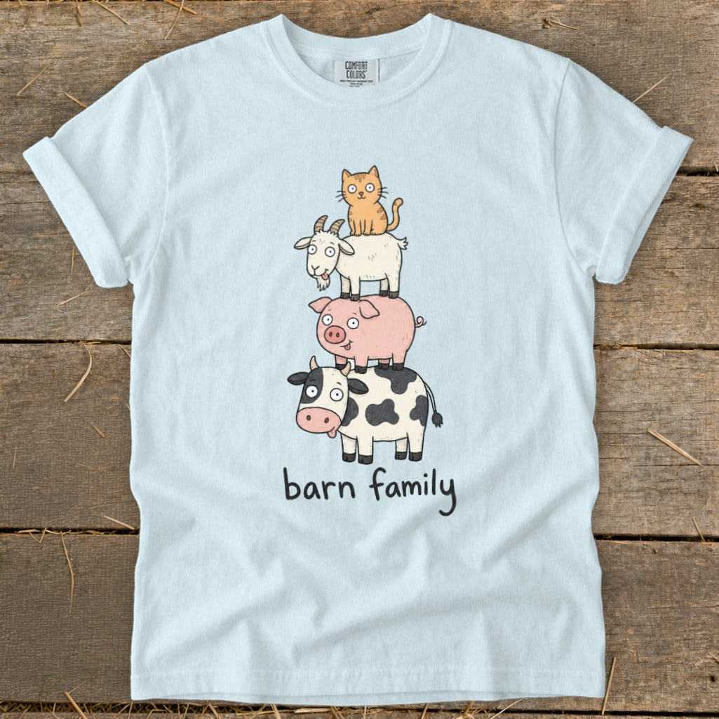 Cartoon cat, goat, pig, and cow stacked with text "barn family".