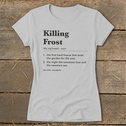 Light gray crewneck t-shirt featuring black dictionary definition text for Killing Frost on a rustic wooden background.