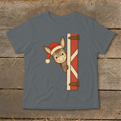 Donkey wearing a Santa hat peeking from behind a barn door graphic on a shirt.