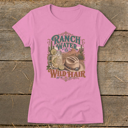 Pink t-shirt with "Ranch Water & Wild Hair" graphic featuring a cowboy hat and drink.