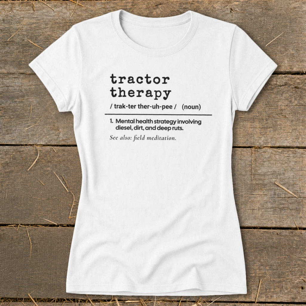 White t-shirt with black text defining "tractor therapy" as a mental health strategy.
