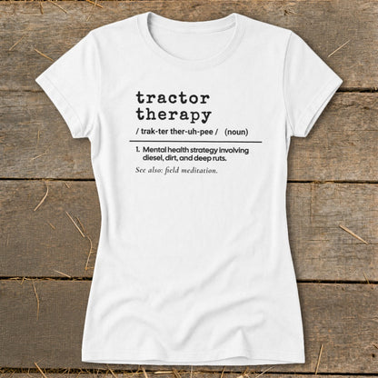 White t-shirt with black text defining "tractor therapy" as a mental health strategy.