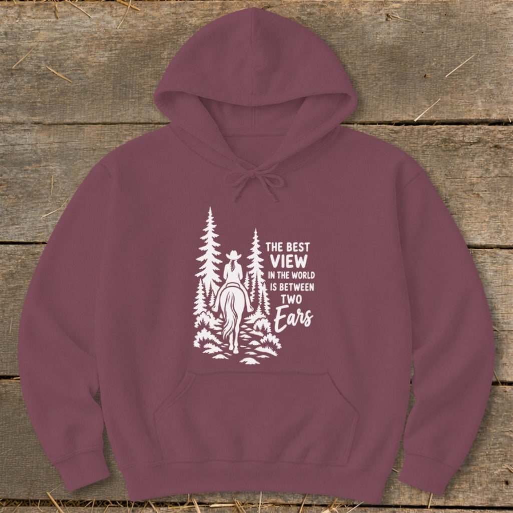Maroon hooded sweatshirt with a white graphic of a horseback rider and text reading "The Best View in the World is Between Two Ears".