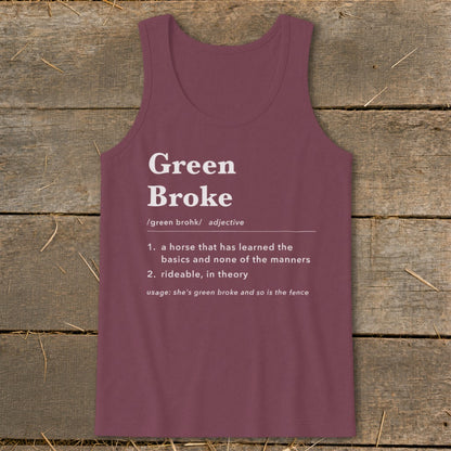 Maroon women's tank top with a dictionary definition print of Green Broke against a wooden background.