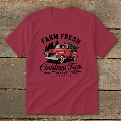 Red vintage truck with Christmas trees and "Farm Fresh Christmas Trees" text.