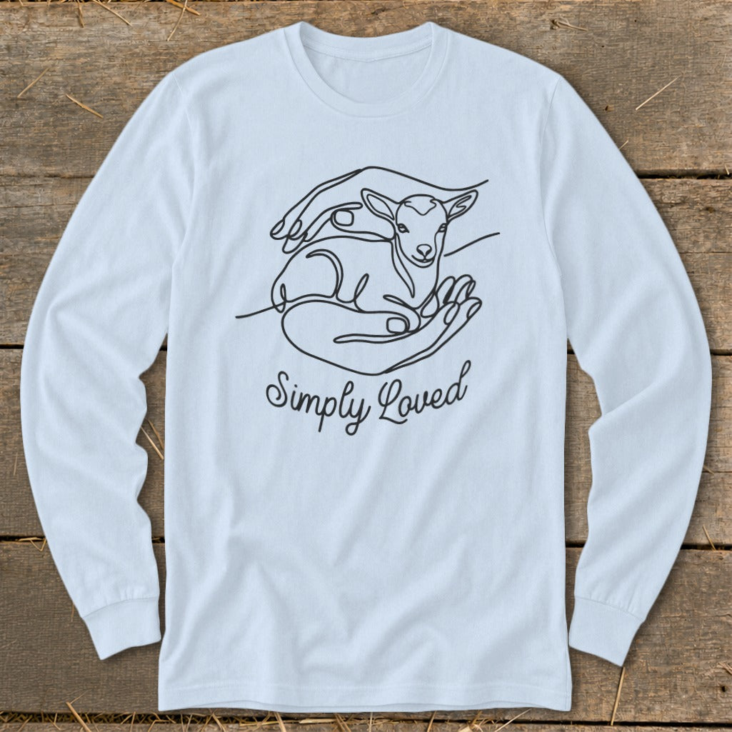 Light blue long sleeve shirt with a line drawing of a lamb in hands and "Simply Loved" text.