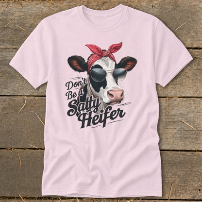 Pink t-shirt with cow wearing bandana and sunglasses, text says "Don't Be a Salty Heifer".