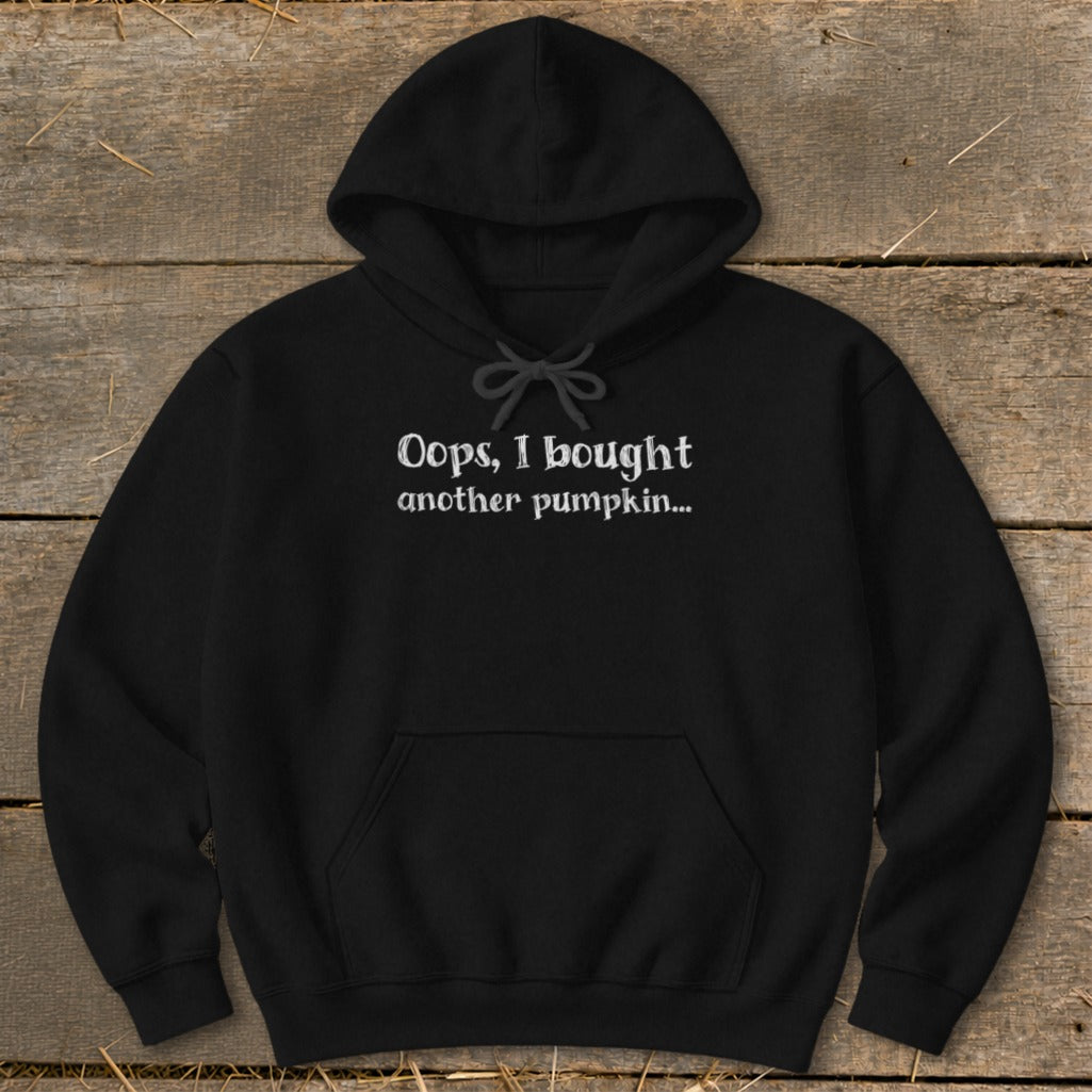 Black hoodie with white text that says "Oops, I bought another pumpkin..."