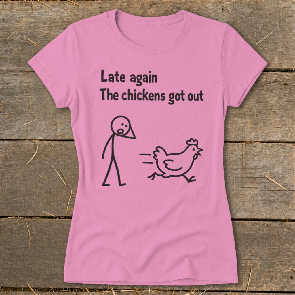 Pink t-shirt with "Late again The chickens got out" text and stick figure chasing chicken.