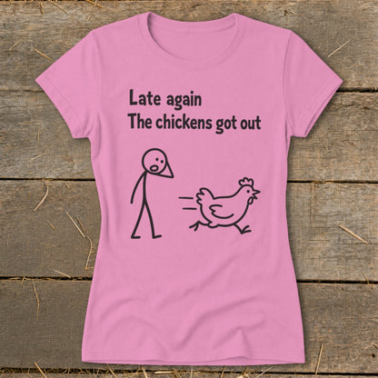 Pink t-shirt with "Late again The chickens got out" text and stick figure chasing chicken.