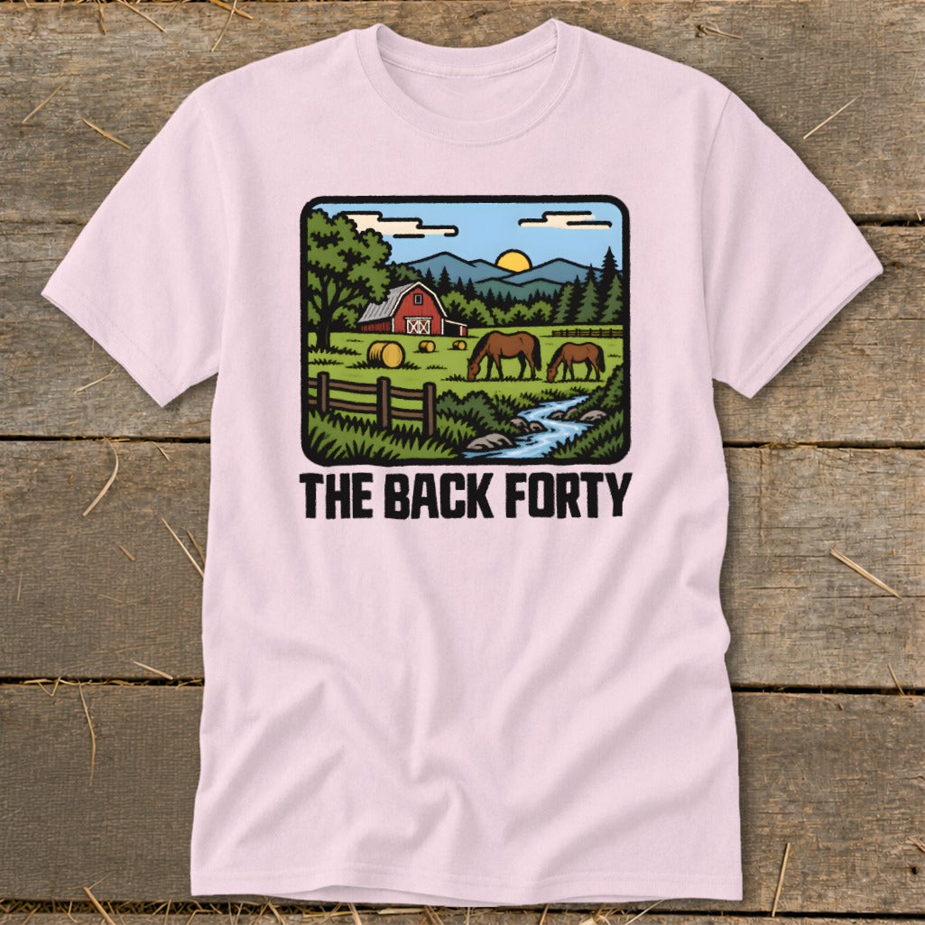 Light pink t-shirt featuring a retro cartoon farm scene and the text "The Back Forty".