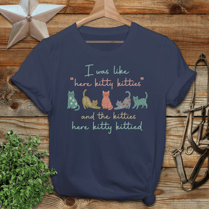 T-shirt with colorful cats and text "I was like 'here kitty kitties' and the kitties here kitty kittied".