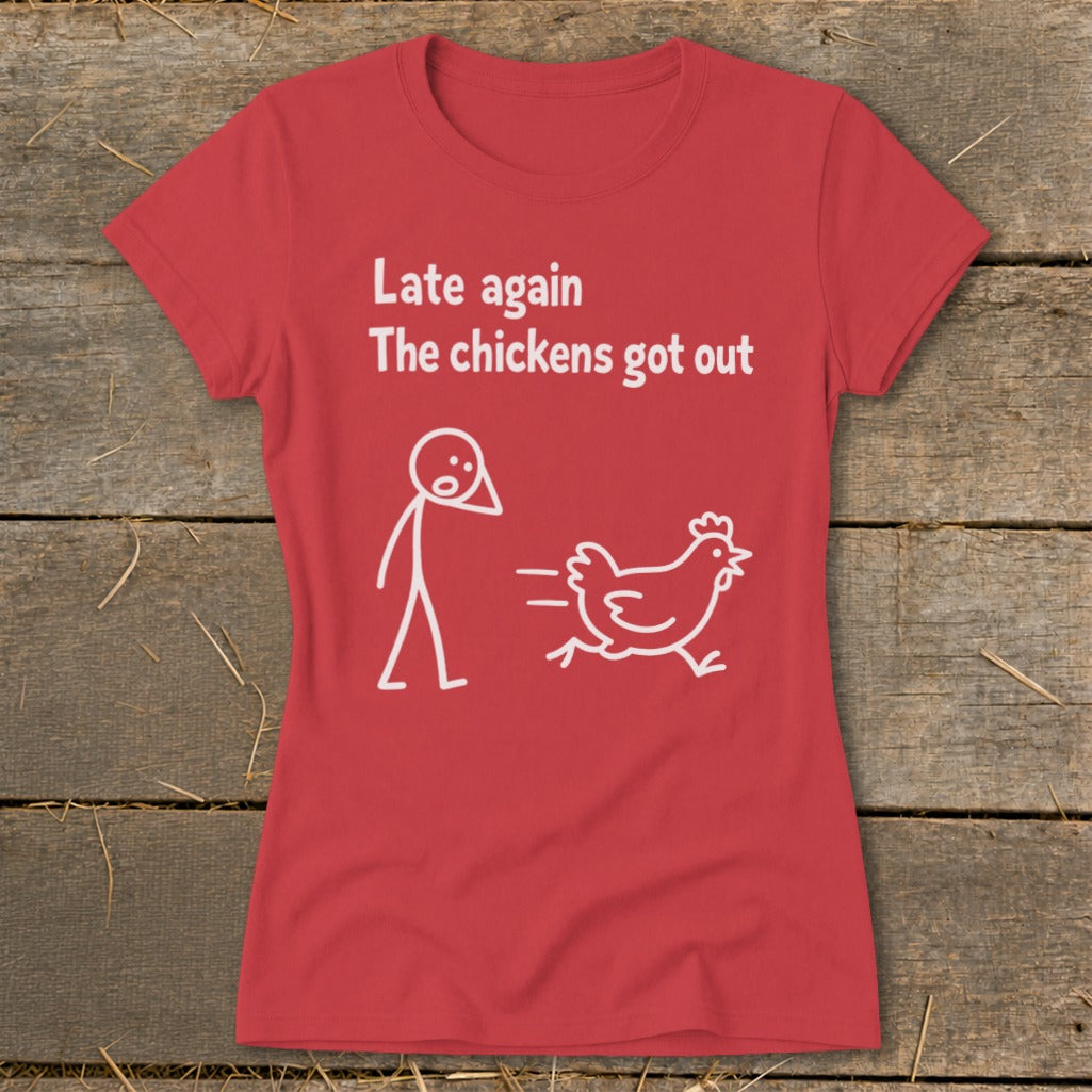 Red t-shirt with text "Late again The chickens got out" and stick figure.