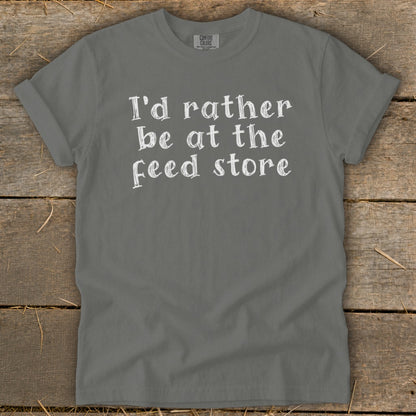 Gray Comfort Colors t-shirt with white text: "I'd rather be at the feed store."