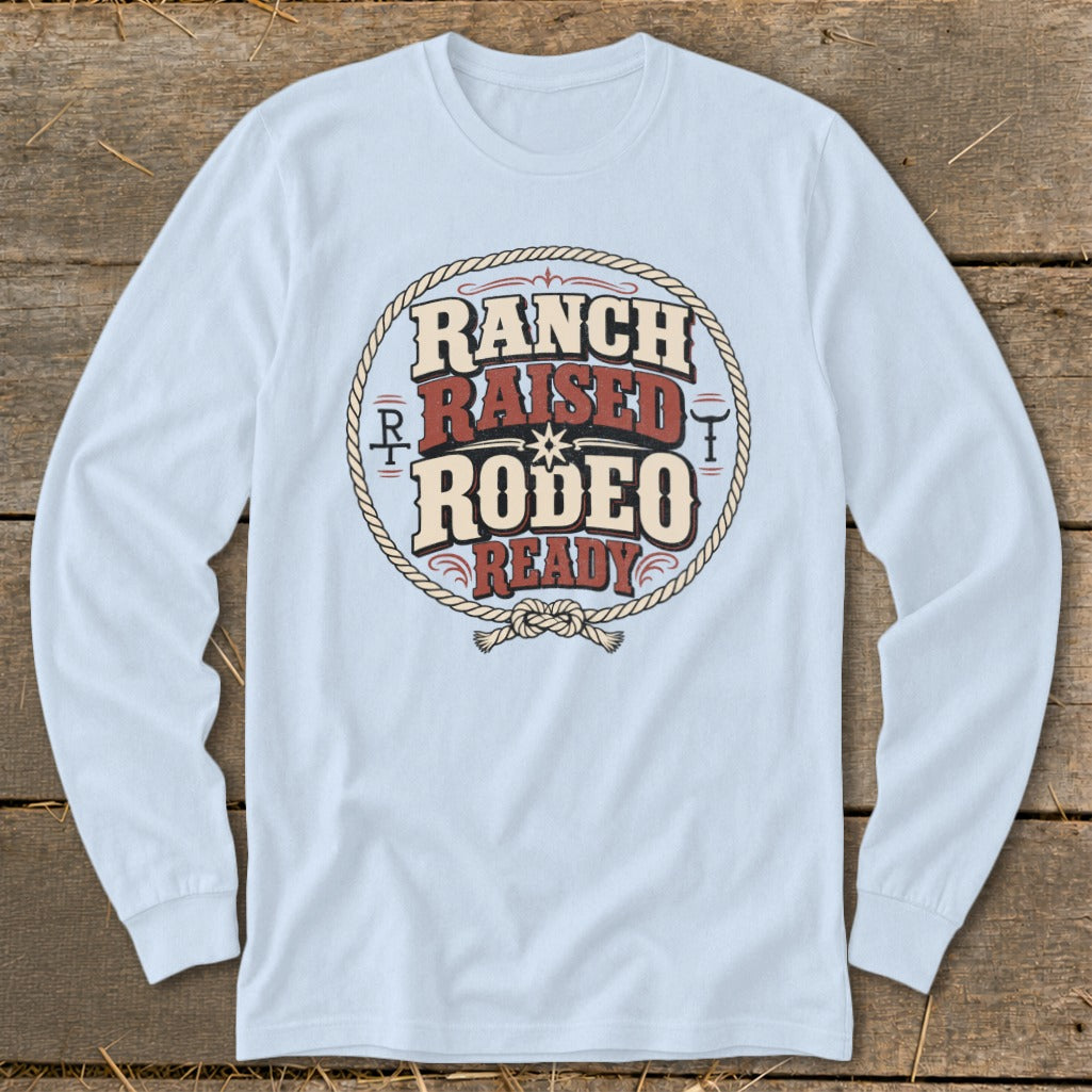 Light blue long sleeve shirt with "Ranch Raised Rodeo Ready" text in a circle.