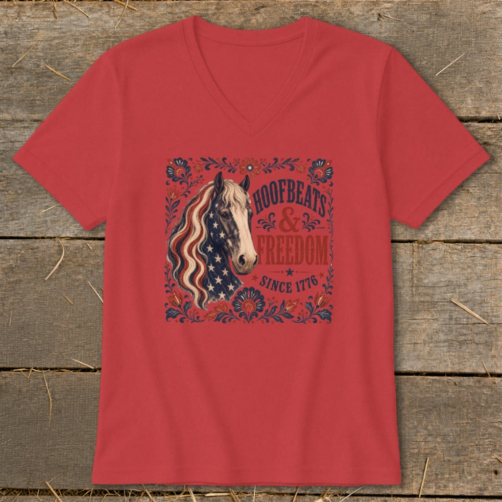Red v-neck t-shirt with a patriotic horse graphic and text "Hoofbeats & Freedom Since 1776."