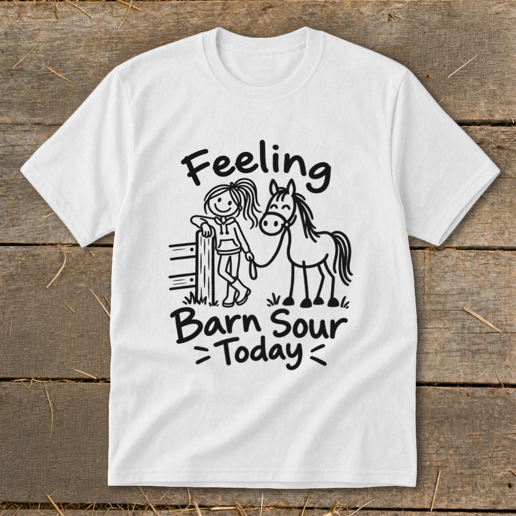 White t-shirt with black graphic of stick-figure girl with horse and text "Feeling Barn Sour Today".