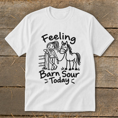White t-shirt with black graphic of stick-figure girl with horse and text "Feeling Barn Sour Today".