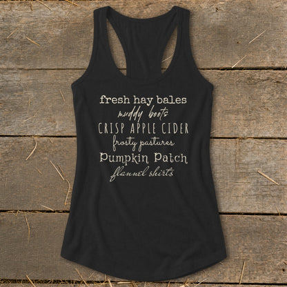 Black tank top with white text listing autumn activities.