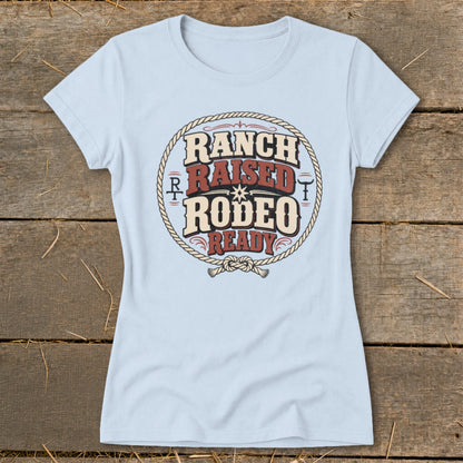 Light blue t-shirt with "Ranch Raised Rodeo Ready" text in a circle.