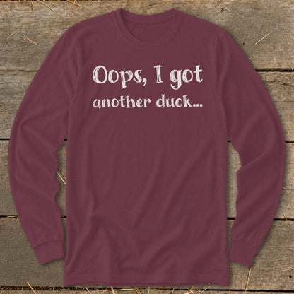 Burgundy long-sleeve shirt with white text "Oops, I got another duck..."
