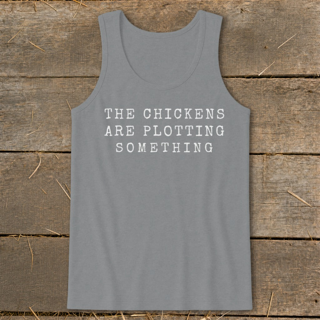 Grey tank top with white text reading "THE CHICKENS ARE PLOTTING SOMETHING".